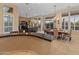 Open concept dining room with views into the living room and kitchen at 12519 W Bajada Rd, Peoria, AZ 85383