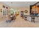 Open concept dining room showcasing views of the kitchen and bar at 12519 W Bajada Rd, Peoria, AZ 85383