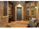 Elegant entryway with a blue door and stone flooring at 12519 W Bajada Rd, Peoria, AZ 85383