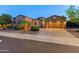 Stunning two-story home with stone exterior and landscaping at 12519 W Bajada Rd, Peoria, AZ 85383