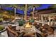 Inviting fire pit surrounded by comfortable seating at 12519 W Bajada Rd, Peoria, AZ 85383