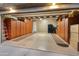 Spacious garage with ample storage cabinets and flooring at 12519 W Bajada Rd, Peoria, AZ 85383