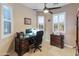 Bright home office with built-in desk and ample natural light at 12519 W Bajada Rd, Peoria, AZ 85383