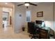 Bright home office with built-in desk and ample natural light at 12519 W Bajada Rd, Peoria, AZ 85383