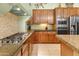 Well-equipped kitchen featuring granite countertops and stainless steel appliances at 12519 W Bajada Rd, Peoria, AZ 85383