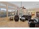 Open living room with views into the kitchen and backyard at 12519 W Bajada Rd, Peoria, AZ 85383