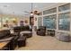 Relaxing living room with leather furniture and large windows at 12519 W Bajada Rd, Peoria, AZ 85383