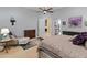 Spacious main bedroom with sitting area and access to bathroom at 12519 W Bajada Rd, Peoria, AZ 85383