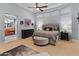 Luxurious main bedroom with ensuite bathroom and ample space at 12519 W Bajada Rd, Peoria, AZ 85383