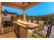 Enjoy grilling and outdoor entertaining at this built-in outdoor kitchen at 12519 W Bajada Rd, Peoria, AZ 85383