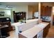 Kitchen with island and breakfast bar, open to living area at 1414 N Estrada --, Mesa, AZ 85207