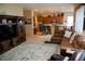 Spacious living room with L-shaped sectional sofa and large TV at 1414 N Estrada --, Mesa, AZ 85207