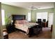 Large main bedroom with king-size bed and private access at 1414 N Estrada --, Mesa, AZ 85207