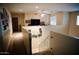 Upstairs hallway with access to bedrooms and loft at 1414 N Estrada --, Mesa, AZ 85207