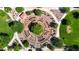Aerial view showcasing elaborate park layout with intricate landscaping and circular design at 14200 W Village Pkwy # 113, Litchfield Park, AZ 85340