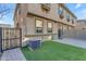Backyard with AC unit and wood fence at 1448 N 80Th Dr, Phoenix, AZ 85043