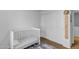 bedroom with crib, closet, and toys at 1448 N 80Th Dr, Phoenix, AZ 85043