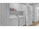 Bright laundry room with washer and dryer at 1448 N 80Th Dr, Phoenix, AZ 85043