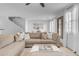 Spacious living room with sectional sofa and stylish decor at 1448 N 80Th Dr, Phoenix, AZ 85043