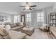 Spacious living room with sectional sofa and stylish decor at 1448 N 80Th Dr, Phoenix, AZ 85043