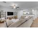 Spacious living room with sectional sofa and stylish decor at 1448 N 80Th Dr, Phoenix, AZ 85043