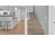 Modern staircase leading from kitchen to upper level at 1448 N 80Th Dr, Phoenix, AZ 85043