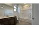 Clean bathroom with a tub, shower, vanity, and tiled floor at 15790 W Hackamore Dr, Surprise, AZ 85387