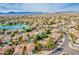 Aerial view of community with lake and houses at 16008 S 35Th St, Phoenix, AZ 85048