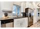 Kitchen with stainless steel appliances and ample cabinet space at 17200 W Bell Rd # 196, Surprise, AZ 85374