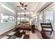 Bright living room with large windows and comfortable seating at 17200 W Bell Rd # 196, Surprise, AZ 85374