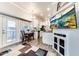 Living area with kitchen views, fireplace and dining area at 17200 W Bell Rd # 196, Surprise, AZ 85374