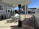 Covered patio with seating area and gas grill at 17200 W Bell Rd # 196, Surprise, AZ 85374