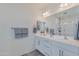 Double vanity bathroom with modern finishes at 17403 W Eagle Ct, Goodyear, AZ 85338