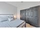 Bright bedroom featuring a comfortable bed and spacious closet at 17403 W Eagle Ct, Goodyear, AZ 85338