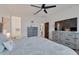 Spacious bedroom with large TV and dresser at 17403 W Eagle Ct, Goodyear, AZ 85338