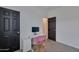 Bright home office with a desk and ample space at 17403 W Eagle Ct, Goodyear, AZ 85338