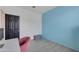 Modern home office with a desk and storage at 17403 W Eagle Ct, Goodyear, AZ 85338