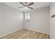 Light and airy bedroom with wood floors and window at 17440 W Eugene Ter, Surprise, AZ 85388