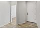Bright and spacious entryway with wood-look flooring at 17440 W Eugene Ter, Surprise, AZ 85388