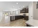 Modern kitchen with stainless steel appliances and an island at 17440 W Eugene Ter, Surprise, AZ 85388