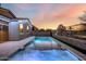 Relaxing pool and spa area with lighting at 17440 W Eugene Ter, Surprise, AZ 85388