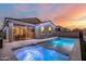Stunning backyard oasis featuring a sparkling pool and spa at 17440 W Eugene Ter, Surprise, AZ 85388