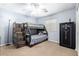 Bedroom with bunk beds, ceiling fan, and ample floor space at 1762 S Saddle St, Gilbert, AZ 85233