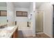 Bathroom with granite countertop, single sink, and shower/tub combo at 1762 S Saddle St, Gilbert, AZ 85233