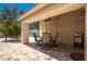 Covered patio with pool view, seating area, and ceiling fan at 1762 S Saddle St, Gilbert, AZ 85233