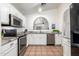 Kitchen with granite countertops and stainless steel appliances at 1762 S Saddle St, Gilbert, AZ 85233