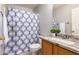Clean bathroom with granite countertop, shower, and updated fixtures at 1762 S Saddle St, Gilbert, AZ 85233