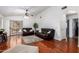 Living room featuring hardwood floors and patio access at 1762 S Saddle St, Gilbert, AZ 85233