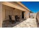 Covered patio with dining area, grill, and built-in seating at 1762 S Saddle St, Gilbert, AZ 85233