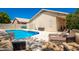 Relaxing pool area with patio furniture and lush landscaping at 1762 S Saddle St, Gilbert, AZ 85233